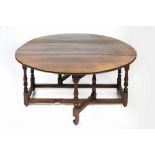 Large oak gate-leg dining table 18th Century, with two drop leaves and turned supports, 154cm