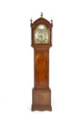 Mahogany longcase clock with arched brass and silvered dials by Christian Goddard of London,