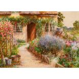 James Townshend (c.1860-1949) A cottage garden signed watercolour 26 x 36cm.