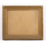 A 19TH CENTURY GILT FRAME with acanthus moulded border and cabochon corners, rebate 47.5 x 60.5cm