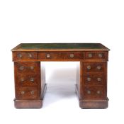 A MID VICTORIAN BURR AND FIGURED WALNUT PEDESTAL DESK with green leather inset top fitted with one