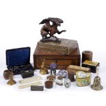 A COLLECTION OF OBJECTS including a carved wood griffin, two millefiori glass paperweights, a pietra