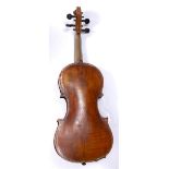 A CONTINENTAL VIOLIN with two piece back bearing label ' Guarnerius Fecit Cremonae Anno 1734',