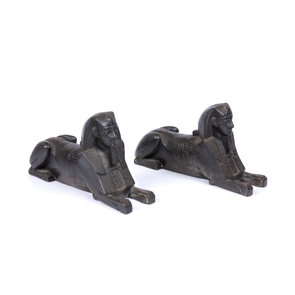 A PAIR OF 19TH CENTURY BRONZE RECUMBENT SPHINXES, each cast with textured and hieroglyphic - Image 2 of 2