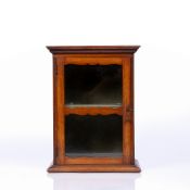 A LATE 19TH CENTURY MAHOGANY SMALL TABLE TOP DISPLAY CABINET, with glazed door enclosing a shelf,
