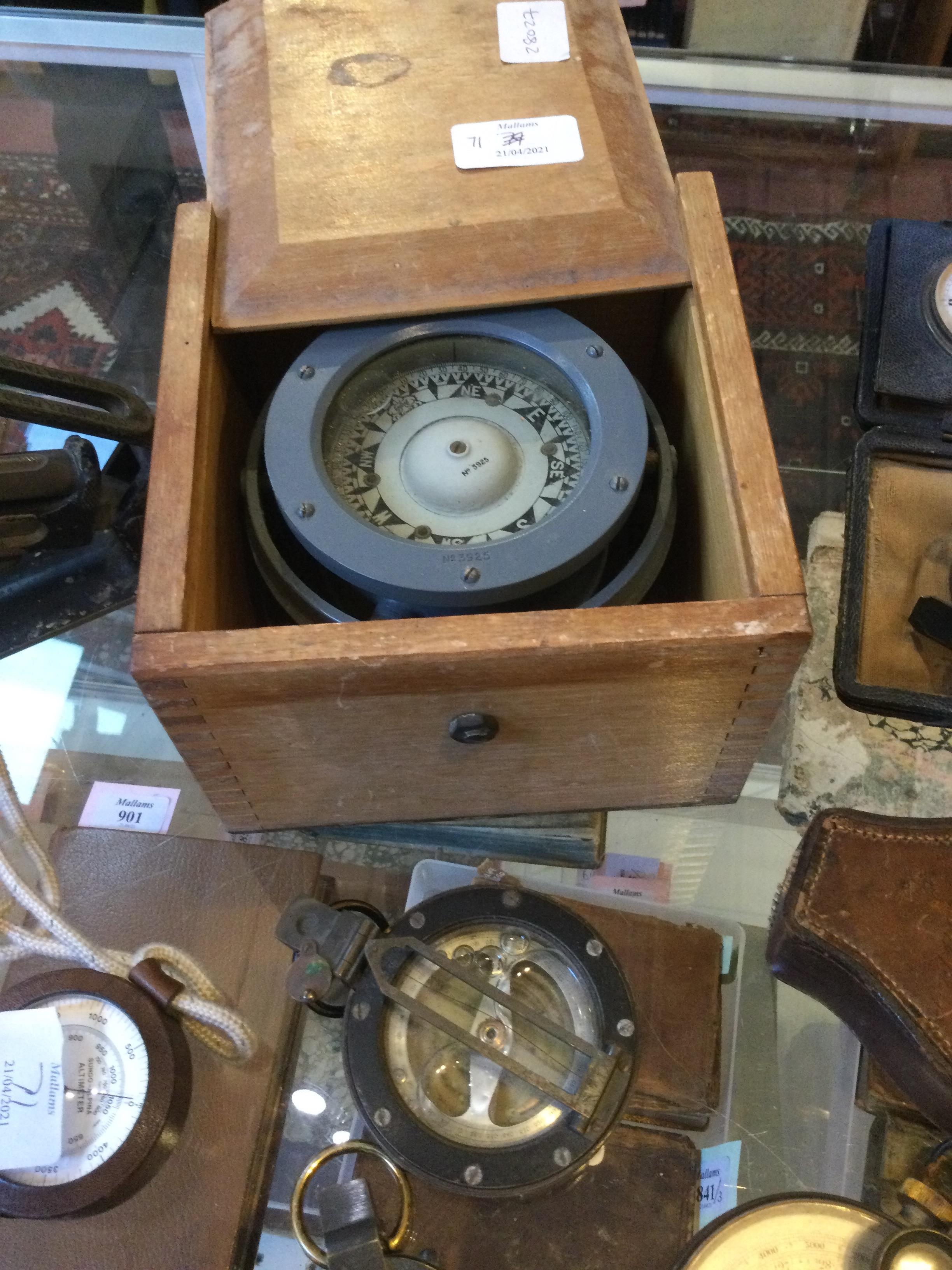 AN OLD EBONISED AND BRASS CASED POCKET ALTIMETER/BAROMETER, the silvered dial engraved 'Paul - Image 2 of 3