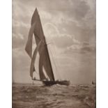 A LARGE BLACK AND WHITE PHOTOGRAPH depicting a J Class yacht at sea possibly by Kenneth Beken