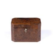 A GEORGE III BURR YEW TEA CADDY of rectangular form with canted corners, hinged lid and twin