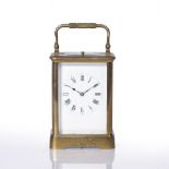 A LATE 19TH CENTURY FRENCH CARRIAGE CLOCK with white enamel Roman dial, silvered platform lever