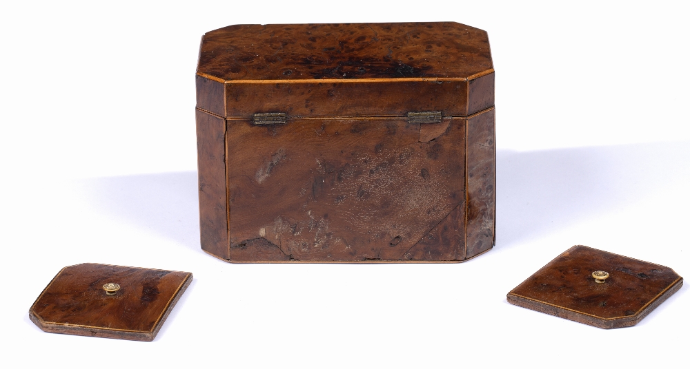 A GEORGE III BURR YEW TEA CADDY of rectangular form with canted corners, hinged lid and twin - Image 4 of 4