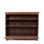 AN EDWARDIAN MAHOGANY OPEN FRONTED BOOKCASE with moulded top above two adjustable shelves flanked by