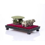 A CHINESE MINIATURE PAINTED WOOD AND METAL FOUR HORSEDRAWN CARRIAGE mounted on a stand, 8" long