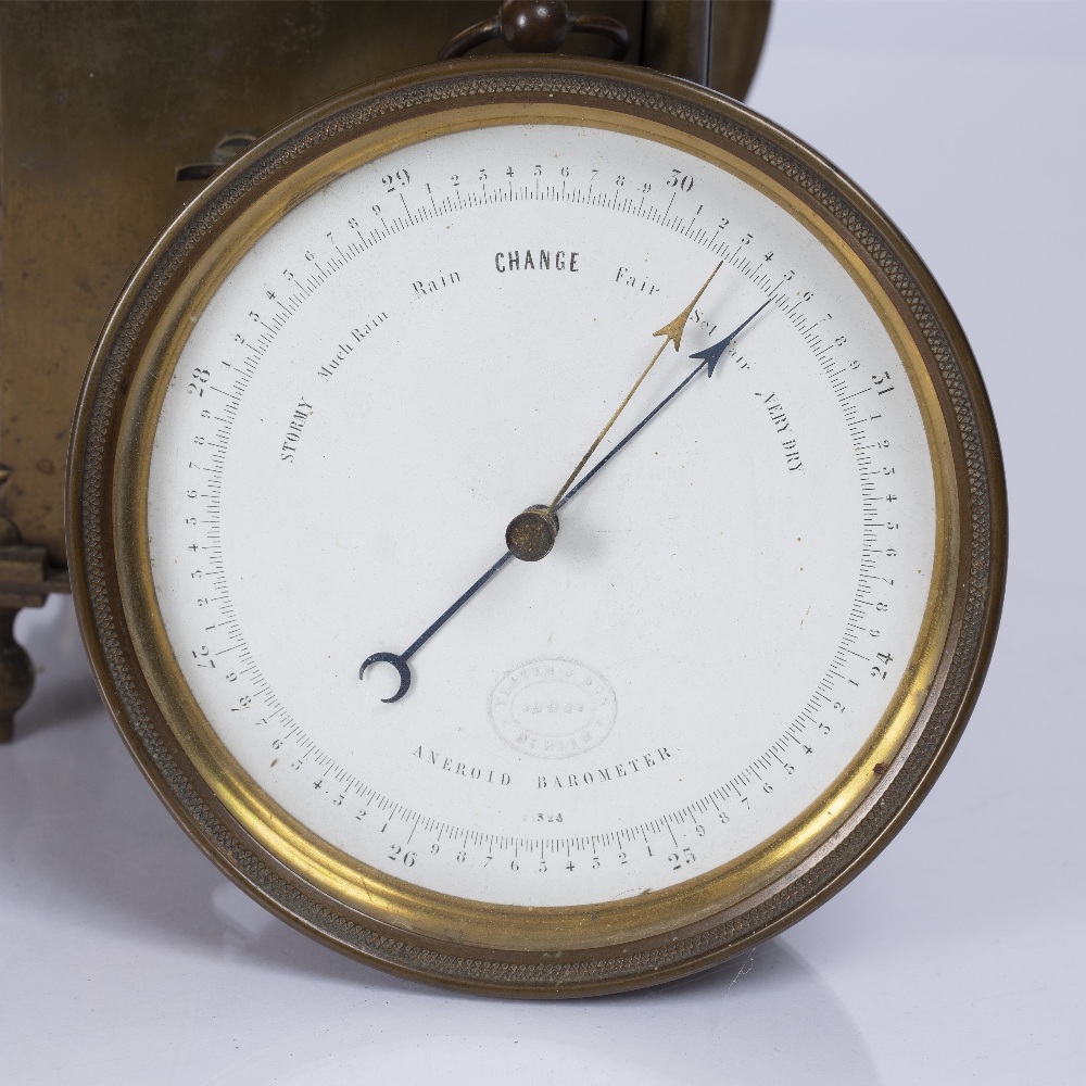 A BRASS ANEROID WALL BAROMETER the dial impressed Yeates & Son, Dublin, 12cm diameter and a brass - Image 3 of 3