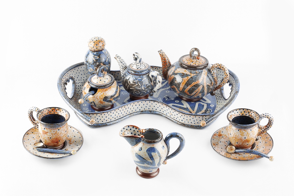 Morgen Hall (1960-2016) Tea and Coffee Set decorated in blue and rust coloured glaze with Islamic