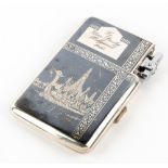 Elvis Presley interest - A Thai white metal combination cigarette case and lighter, given as a