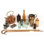 A collection of metalware, various old bottles, walking sticks etcCondition report: at present,