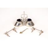 A Victorian silver novelty double salt cellar, by Edward H. Stockwell, in the form of horses hooves,
