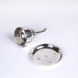 A contemporary silver wine funnel, with engraved oak branch decoration, and a matching silver stand,