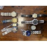 Eight wristwatches, to include an Omega Seamaster, mid century Kelton watch movement, a mid 20th