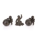 Small bronze model of a boy Chinese, 19th Century the seated boy with his left arm raised, 6cm