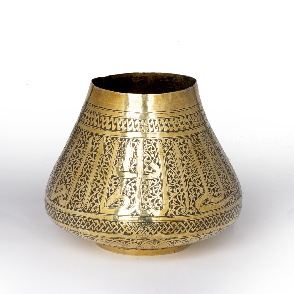 Cairo ware brass water pot Egypt engraved with panels of arabesques and calligraphy, 17.5cm high