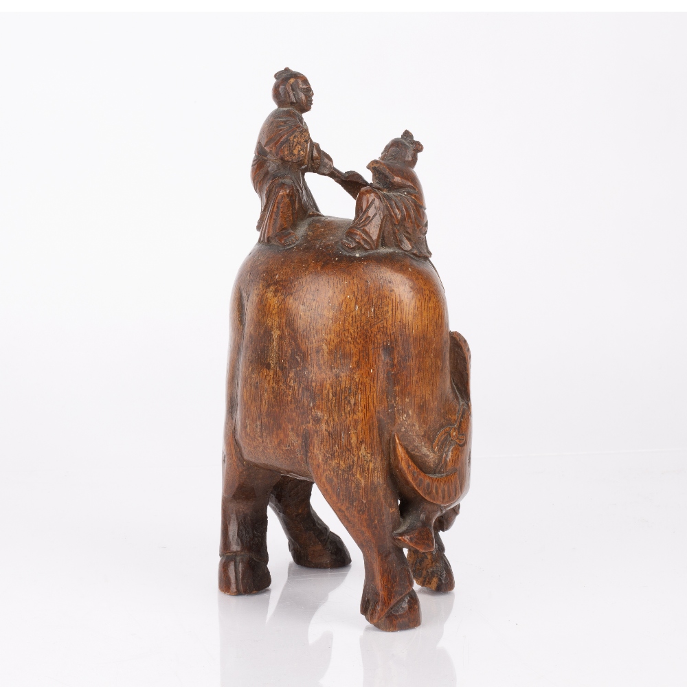 Root carving Chinese depicting two figures riding a water buffalo, 23cm high Condition: the two - Image 2 of 3