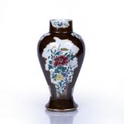 Cafe-au-lait glazed vase Chinese, 18th Century decorated with panels of flowers in famille rose