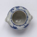 Blue and white footed bowl Japanese, 19th Century decorated with westerners in a garden under a