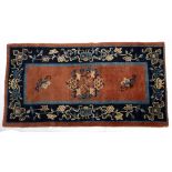 Peking runner Chinese decorated to the centre with butterflies and flowers in ground orange,