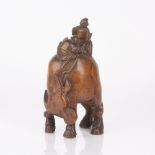 Root carving Chinese depicting two figures riding a water buffalo, 23cm high Condition: the two