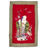 Large embroidered panel of Shulao Chinese the standing figure set on a silk red ground, overall size