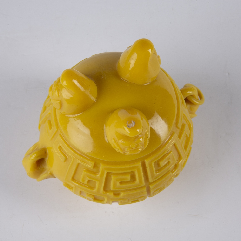 Yellow glass censer Chinese with the sides carved in low relief depicting archaic symbols, supported - Image 3 of 4