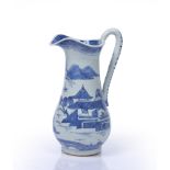 Blue and white ewer Chinese, circa 1800 decorated with a landscape scene to the body depicting a