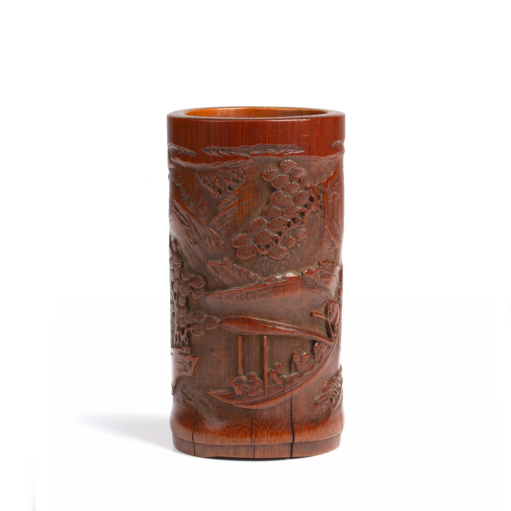 Carved bamboo brushpot Chinese, 18th/19th Century carved with pine trees, river and punt, 12cm