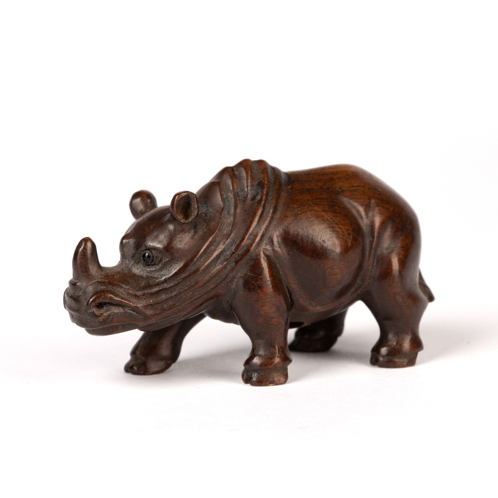 Contemporary wooden netsuke Japanese depicting a standing rhino, signed Meizan, 6cm across