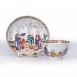 Matched teabowl and saucer Chinese, 18th Century decorated with three women and a child in a garden,