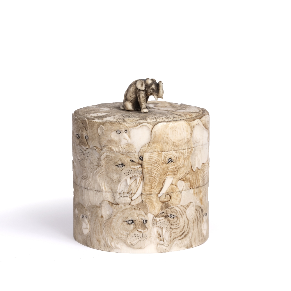 Ivory tusk vase and cover Japanese, Meiji period carved with tigers and elephants, 9cm high, 8.5cm