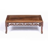 Low table Chinese carved all around with cloud motifs to the rails, 27.5cm high, 75cm wide, 40cm
