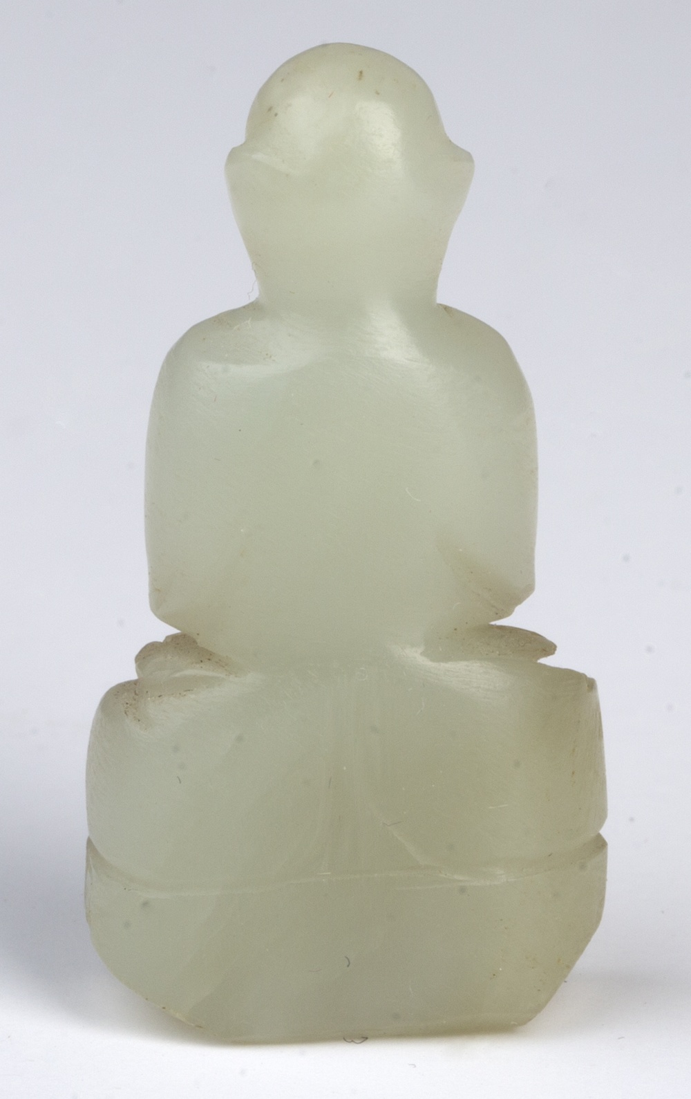 Miniature jade figure of a buddha Chinese the carved figure seated and with arms clasped, 4.25 cm - Image 2 of 2