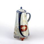 Ko-imari tri-footed water decanter Japanese, 17th Century with a looped handle and tap dispenser,