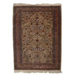 Ivory ground rug Persian with tree of life design within a foliate border, 130cm x 180cm approx