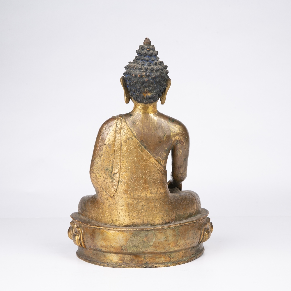 Gilt bronze model of Vajarasana Tibetan, 18th/19th Century the seated figure with engraved foliate - Image 2 of 3