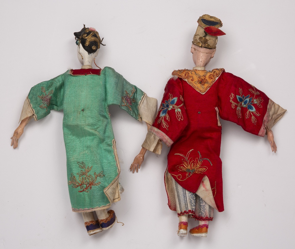 Two dolls Chinese with painted white faces, dressed in elaborate embroidered clothes, 28cm high ( - Image 2 of 2