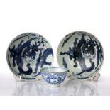 Pair of blue and white provincial bowls Chinese, circa 1800 decorated with dragons to the centre,
