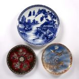 Blue and white charger Japanese, late 19th Century with painted landscape scene, 46cm diameter, a