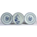 Three blue and white plates Chinese, 18th/19th Century comprising of a pair depicting a central