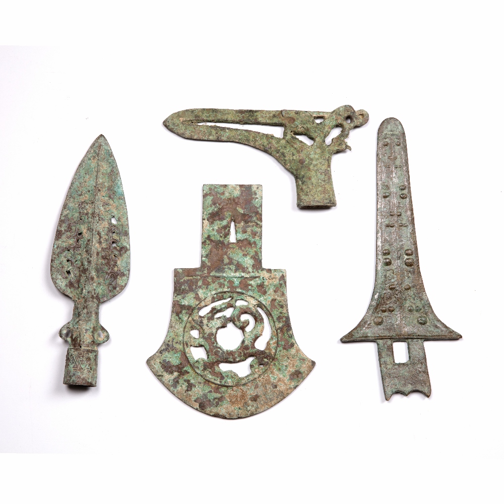 Bronze halberd Chinese a bronze spearhead, a bronze ceremonial axe head and a bronze dagger, largest