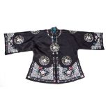 Two embroidered jackets Chinese, 20th Century decorated to the exterior with crashing waves near the