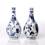 Pair of bottle vases Chinese, 19th Century decorated with figures holding umbrellas and fans, four