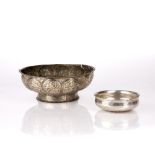 White metal embossed bowl Indo-Persian, 18th/19th Century with foliate lobed arched panels, 21cm